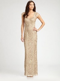 Elegant and regal, embellished with delicate beading and allover soutache embroidery.Sweetheart necklineCap sleevesBeaded soutache embroideryBack cutoutBack ventConcealed side zipFully linedAbout 40 from natural waistNylonSpot cleanImportedModel shown is 5'11 (180cm) wearing US size 4. Elegant and regal, embellished with delicate beading and allover soutache embroidery.Sweetheart necklineCap sleevesBeaded soutache embroideryBack cutoutBack ventConcealed side zipFully linedAbout 40 from natural waistNylonSpot cleanImportedModel shown is 5'11 (180cm) wearing US size 4.