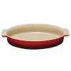 Ideal for baking, roasting, casseroles and more, Le Creuset's stoneware oval dish pairs distinctive design with multipurpose functionality. Oven, broiler and microwave friendly, it will not absorb odors or flavors.