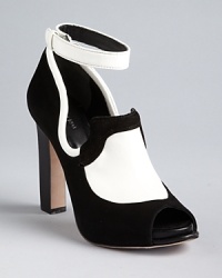 Black and white and red hot all over: these Rachel Roy platform pumps feature distinctive high-contrast oxford styling. Black and white and red hot all over: these Rachel Roy platform pumps feature distinctive high-contrast oxford styling.