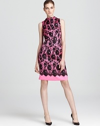 Make a sophisticated statement with this scalloped lace-print Milly shift dress with elegant high neck. Make a sophisticated statement with this scalloped lace-print Milly shift dress with elegant high neck.