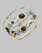 From the Rock Candy® Collection. Five, pretty, milky aquamarine cabochon stations on a delicate 18k gold bangle. Milky aquamarine18K goldDiameter, about 2½Slip-on styleImported Please note: Bracelets sold separately. 