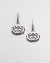 From the Britt Collection. Gleaming double G logos of sterling silver, signature symbols of Gucci style. Sterling silver Length, about 1 Ear wire Made in Italy