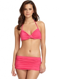 THE LOOKBraided halter straps tie at neckUnderwire cups with gathered bow detail at centerBack tie closureTHE MATERIAL87% nylon/13% spandexFully linedCARE & ORIGINHand washImportedPlease note: Bikini bottom sold separately. THE LOOKBraided halter straps tie at neckUnderwire cups with gathered bow detail at centerBack tie closureTHE MATERIAL87% nylon/13% spandexFully linedCARE & ORIGINHand washImportedPlease note: Bikini bottom sold separately.