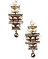 Up your elegance factor in Givenchy's chic chandelier earrings. Blush and white glass pearls and crystal-encrusted spacers combine in a diamond-shaped pattern for an illuminating look. Set in brown gold-plated mixed metal. Approximate drop: 2-1/2 inches.