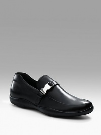 Soft calfskin with strap and logo buckle detail. Leather lining Padded insole Leather sole Made in Italy Soft calfskin with strap and logo buckle detail. Leather lining Padded insole Leather sole Made in Italy