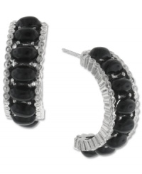 Stir up a little drama with 2028's alluring earrings. These partial hoops feature jet black beads set in silver tone mixed metal. Approximate drop length: 1-1/4 inches. Approximate drop diameter: 3/4 inch. Stir up a little drama with 2028's alluring earrings. These partial hoops feature jet black beads set in silver tone mixed metal. Approximate drop length: 1-1/4 inches. Approximate drop diameter: 3/4 inch.