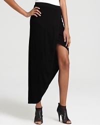 Take your look in a downtown direction with this ribbed BCBGMAXAZRIA skirt, designed with an asymmetric hem for urban attitude. Take your look in a downtown direction with this ribbed BCBGMAXAZRIA skirt, designed with an asymmetric hem for urban attitude.
