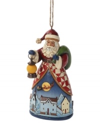 A sneak peek! Preview St. Nick's version of Christmas Eve as the scene unfolds on this Jim Shore ornament. Santa is totally ready, carrying a sack of gifts and a lantern to show him the way. A sneak peek! Preview St. Nick's version of Christmas Eve as the scene unfolds on this Jim Shore ornament. Santa is totally ready, carrying a sack of gifts and a lantern to show him the way.