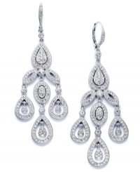 Let sparkle do the talking. Eliot Danori's stunning statement earrings speak volumes with stunning crystal accents and a rhodium-plated silver tone mixed metal setting. Approximate drop: 1-1/2 inches. Let sparkle do the talking. Eliot Danori's stunning statement earrings speak volumes with stunning crystal accents and a rhodium-plated silver tone mixed metal setting. Approximate drop: 1-1/2 inches.