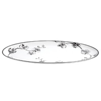 A captivating motif of lifelike orchids stands out in dramatic relief against a backdrop of vibrant white porcelain, giving this dinnerware from Michael Aram bold, artful presence. A captivating motif of lifelike orchids stands out in dramatic relief against a backdrop of vibrant white porcelain, giving this dinnerware from Michael Aram bold, artful presence.