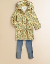 Bright and cheery with colorful fruit pattern, plenty of pockets for all her little necessities, plus a cozy hood to zip on for unpredictable weather.Detachable hood with snap closurePolo collarConcealed front snap closureLong sleeves with button cuffsThree front patch pocketsCottonHand washImported