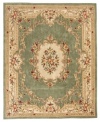 Modeled after 17th century Aubusson rugs, the Jade area rug offers a traditional floral motif in a contemporary sage and ivory colorway. Crafted of rich wool.