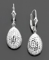 Elegant diamond-cut 14k white gold earrings are a chic accessory for day or night. Drop measures 1-1/4 inch.