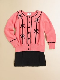 An enchanting cardi with bows, pointelle design and grosgrain-covered buttons makes for one sweet topper.Pointelle collarLong sleevesFront button placketPointelle detail at cuffs and hem72% viscose/28% polyesterHand washImported Please note: Number of buttons may vary depending on size ordered. An enchanting cardi with bows, pointelle design and grosgrain-covered buttons makes for one sweet topper.Pointelle collarLong sleevesFront button placketPointelle detail at cuffs and hem72% viscose/28% polyesterHand washImported Please note: Number of buttons may vary depending on size ordered.