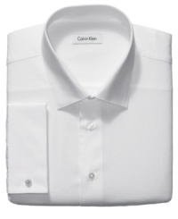 Subtle texture and a classic construction make this understated Calvin Klein dress shirt a must-have addition to any guy's workweek wardrobe. Subtle texture and a classic construction make this understated Calvin Klein dress shirt a must-have addition to any guy's workweek wardrobe.