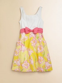 A full skirt with cheery floral detail and a cinched bow and sash waistline define this sunny frock.ScoopneckSleevelessBack zipperFitted bodiceWaistband sash with bowFlat front pocketsFull skirtCottonMachine washImported A full skirt with cheery floral detail and a cinched bow and sash waistline define this sunny frock.ScoopneckSleevelessBack zipperFitted bodiceWaistband sash with bowFlat front pocketsFull skirtCottonMachine washImported