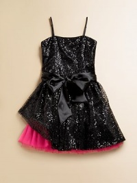 Full of frill, this notice-me frock shines like a disco ball covered in sequins and then finished off with a full, peekaboo hem.Straight necklineSleeveless with spaghetti strapsBack zipperWaistband with sash tieFull skirt with peekaboo hemPolyesterDry cleanMade in the USA of imported fabric Full of frill, this notice-me frock shines like a disco ball covered in sequins and then finished off with a full, peekaboo hem.Straight necklineSleeveless with spaghetti strapsBack zipperWaistband with sash tieFull skirt with peekaboo hemPolyesterDry cleanMade in the USA of imported fabric