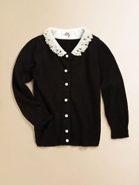 A rhinestone and pearl collar define this long-sleeved, cozy cardigan.Removable pearl and rhinestone collarLong sleevesButton-frontPointelle detail at wrists and waistband50% viscose/45% Polyamid/5% CashmereRemove collar and hand washImported Please note: Number of buttons may vary depending on size ordered. A rhinestone and pearl collar define this long-sleeved, cozy cardigan.Removable pearl and rhinestone collarLong sleevesButton-frontPointelle detail at wrists and waistband50% viscose/45% Polyamid/5% CashmereRemove collar and hand washImported Please note: Number of buttons may vary depending on size ordered.