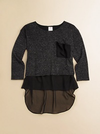 Sparkling silhouette with an exaggerated hi-low hem and front patch pocket for a casual-cool layered look. CrewneckLong sleevesFront patch pocketHi-lo hemPolyester/lurexHand washMade in USA of imported fabric Sparkling silhouette with an exaggerated hi-low hem and front patch pocket for a casual-cool layered look. CrewneckLong sleevesFront patch pocketHi-lo hemPolyester/lurexHand washMade in USA of imported fabric
