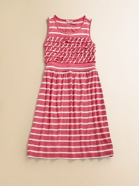 Adorned with bold stripes and a ruffled bodice, this cute frock has all the right touches.ScoopneckSleevelessPullover styleRuffled bodiceFlat waist95% viscose/5% spandexHand washImported Adorned with bold stripes and a ruffled bodice, this cute frock has all the right touches.ScoopneckSleevelessPullover styleRuffled bodiceFlat waist95% viscose/5% spandexHand washImported