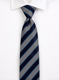 EXCLUSIVELY OURS. A sharply defined striped tie, cut from smooth Italian silk commands attention in the boardroom and beyond.About 3½ wideSilkDry cleanMade in Italy EXCLUSIVELY OURS. A sharply defined striped tie, cut from smooth Italian silk commands attention in the boardroom and beyond.About 3½ wideSilkDry cleanMade in Italy