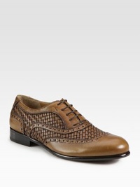 Charming woven detail makes this lace-up design one step ahead of rest, crafted in Italian leather.Leather upperPadded insoleLeather soleMade in Italy Charming woven detail makes this lace-up design one step ahead of rest, crafted in Italian leather.Leather upperPadded insoleLeather soleMade in Italy