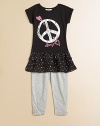 She'll fall in love with this alluring set featuring an ultra-soft tunic with peace sign, crinkle chiffon tiered hem and matching leggings. Tunic CrewneckShort cuffed sleevesPullover styleDrop waistRuffled hem Leggings Elastic waistbandAnkle snapsTunic: 95% polyester/5% spandexLeggings: 95% cotton/5% spandexMachine washImported Please note: Number of buttons may vary depending on size ordered. 