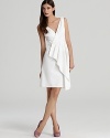 A modern-day Marilyn, this Rachel Roy wrap dress plays up warm white with a careful cut for a distinctly feminine look.