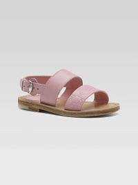 Logo-embossed Guccissima leather in front and smooth leather in back combine in a classic sandal that's both sturdy and pretty.Leather upperBuckle ankle strapLeather sole with non-slip rubber finishMade in Italy Logo-embossed Guccissima leather in front and smooth leather in back combine in a classic sandal that's both sturdy and pretty.Leather upperBuckle ankle strapLeather sole with non-slip rubber finishMade in Italy