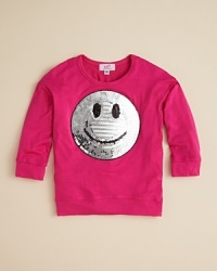 Smile! Sofi's adorable sweatshirt shines it on with a sequin smiley face. Smile! Sofi's adorable sweatshirt shines it on with a sequin smiley face.
