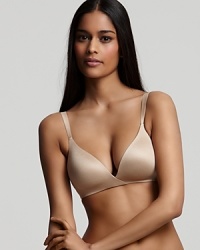 A seductive wire-free demi bra with ergonomic straps and a streamlined silhouette. A seductive wire-free demi bra with ergonomic straps and a streamlined silhouette.