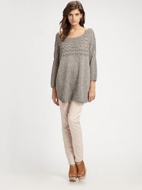 Elaborately textured boatneck with perforated details, dropped shoulders and a long silhouette. BoatneckPerforated, dropped shouldersLong sleevesRibbed cuffsLonger length hits below the hips84% cotton/12% acetate/2% polyester/2% nylon Dry cleanImported of Italian fabric Elaborately textured boatneck with perforated details, dropped shoulders and a long silhouette. BoatneckPerforated, dropped shouldersLong sleevesRibbed cuffsLonger length hits below the hips84% cotton/12% acetate/2% polyester/2% nylon Dry cleanImported of Italian fabric