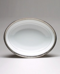 The Crestwood Platinum dinnerware and dishes collection features white china embellished with a border of interlocking scrolled leaves and an edge of polished platinum. The Crestwood Platinum dinnerware and dishes collection features white china embellished with a border of interlocking scrolled leaves and an edge of polished platinum.
