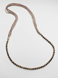 An artistic and modern design with faceted beads on a multi-row mesh chain. Glass beadsGalvanized mesh wireLength, about 39Slip-on styleImported 