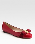 Glossy patent leather classic is a favorite with signature grosgrain bow at the toe. Grosgrain bow and logo hardware at toe Leather lining and sole Made in ItalyOUR FIT MODEL RECOMMENDS ordering true size.
