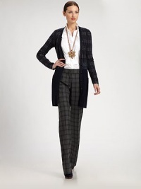 Crisply tailored from a finespun cotton blend, this wear-with-all style features a unique, architectural pleated bib.Stand collarConcealed button frontPleated bibLong sleeves with button cuffsBack darts75% cotton/21% nylon/4% elastaneDry cleanMade in ItalyModel shown is 5'11 (180cm) wearing US size 2. Crisply tailored from a finespun cotton blend, this wear-with-all style features a unique, architectural pleated bib.Stand collarConcealed button frontPleated bibLong sleeves with button cuffsBack darts75% cotton/21% nylon/4% elastaneDry cleanMade in ItalyModel shown is 5'11 (180cm) wearing US size 2.