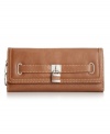 Been searching for a slender, ladylike wallet that's sturdy enough to carry all your cards, cash, and coins with ease? Look no further than this Nine West design that organizes all your essentials effortlessly. Plenty of compartments and pockets align the interior, while delicate detail stitching and polished silver-tone hardware adorn the outside.