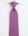 A fine silk tie with a brilliant print that represents the Salvatore Ferragamo aesthetic.SilkDry cleanMade in Italy