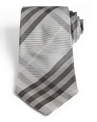 A classic silk tie in Burberry's iconic check print. A classic silk tie in Burberry's iconic check print.