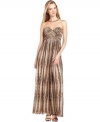 A soft print and a sweeping silhouette are brightened by metallic dots on Calvin Klein's latest gown.