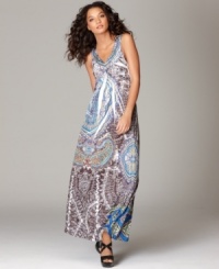 Exotic prints and sumptuous studs elevate One World's casual maxi dress. Pair with statement sandals to complete the look. Exotic prints and sumptuous studs elevate One World's casual maxi dress. Pair with statement sandals to complete the look.