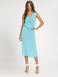 Supple silk jersey drapes beautifully in this gorgeous blouson silhouette styled with a leg-baring midi-length skirt.V necklineSleevelessDraped blouson bodiceStraight-line skirtSide slitAbout 32 from natural waist95% silk/5% spandexDry cleanImportedModel shown is 5'11 (180cm) wearing US size 4.OUR FIT MODEL RECOMMENDS ordering true size. Supple silk jersey drapes beautifully in this gorgeous blouson silhouette styled with a leg-baring midi-length skirt.V necklineSleevelessDraped blouson bodiceStraight-line skirtSide slitAbout 32 from natural waist95% silk/5% spandexDry cleanImportedModel shown is 5'11 (180cm) wearing US size 4.OUR FIT MODEL RECOMMENDS ordering true size.