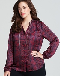 Under a blazer or with flare leg jeans, a bold MICHAEL Michael Kors Plus blouse infuses your look with easy, elegant glamour. Under a blazer or with flare leg jeans, a bold MICHAEL Michael Kors Plus blouse infuses your look with easy, elegant glamour.
