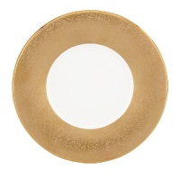 A scintillating band adorns the perimeter of this alluring saucer, sprinkled with gold dust for dramatic effect, and crafted with a classic shape that suits all your formal presentations. A scintillating band adorns the perimeter of this alluring saucer, sprinkled with gold dust for dramatic effect, and crafted with a classic shape that suits all your formal presentations.