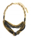 Fit to be tied. Multicolored chains knotted together create a statement worth making in this intricate BCBGeneration necklace. Crafted in hematite tone and gold tone mixed metal. Approximate length: 16 inches. Approximate drop: 3-1/2 inches.