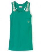 GUESS Kids updates the racerback tank top with sequin patches at the shoulder.
