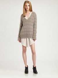 Retro, metallic stripes surround this lengthy, angora-rich sweater. Ribbed v-neckLong sleevesRibbed hem hits below the hips57% angora/20% polyamide/10% wool/3% acetateHand washMade in ItalyModel shown is 5'10 (177cm) wearing US size 2.