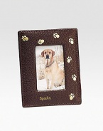 Handcrafted of French goatskin with a golden trail of paw prints, it's an ideal display for the four-legged love of your life. Holds 2¾ X 3¾ photo Made in USAFOR PERSONALIZATIONSelect a color and quantity, then scroll down and click on PERSONALIZE & ADD TO BAG to choose and preview your monogramming options. Please allow 1 week for delivery.