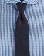 Sophisticated solid design set in fine Italian silk.SilkDry cleanMade in Italy
