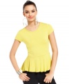 A ruffled peplum hem adds a fashion-forward flair to this otherwise basic Bar III top -- a stylish spin on a staple!